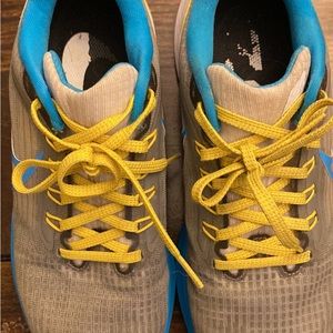 Blue and Yellow Nike Tennis Shoes